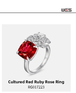 Macro detail of S925 silver ring featuring cushion-cut ruby in a rose petal setting