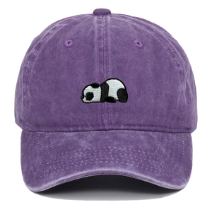 Close-up of high-quality panda embroidery on purple washed vintage cotton baseball cap