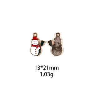 Detail of red and white enamel snowman charm with dimensions 13x21mm and 1.03g weight