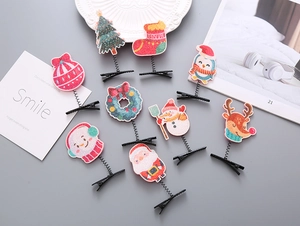 Detailansicht von 8 Weihnachts-Haarspangen mit Glitzer, Rentier und Weihnachtsmann