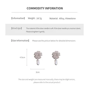 Size chart showing dimensions of silver flower pearl earrings with rhinestone accents
