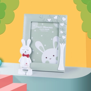 Cartoon mint green picture frame with 3D bunny and heart relief for desktop or wall