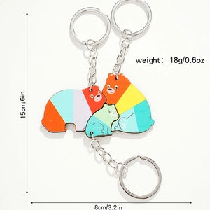Detailed view showing dimensions and weight of colorful wooden animal puzzle keychain