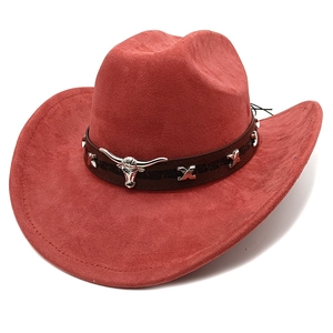 Red faux suede western cowboy hat with wide brim and leather band featuring bull head metal detail