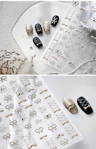 Macro detail of TL-343 3D embossed bow nail stickers with lace corset patterns
