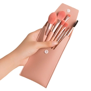 Handheld 8pcs mini pink makeup brush set with rose gold handles and leather pouch