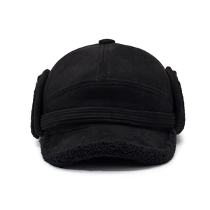 Men's winter black trapper hat with suede shell and warm fleece earflaps for cold weather