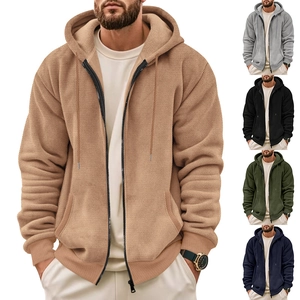 Detailed waffle knit texture and structure of the men's zip-up hooded jacket