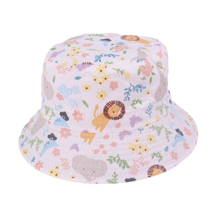 Detailed view of kids sun hat with colorful lion and elephant cartoon prints on white fabric