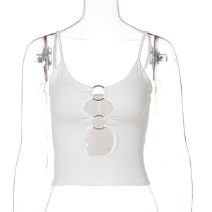 Detail of white cropped tank top featuring hollow-out front and silver metal rings