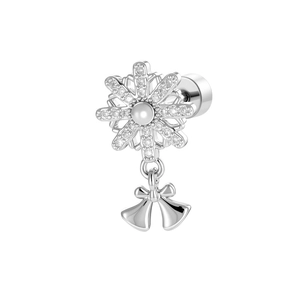 Silver snowflake earring with center pearl and bow pendant on a clean white background
