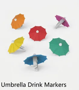 Close-up of colorful umbrella shaped silicone drink markers for wine glasses