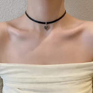French style crystal heart choker with black cord and silver-rimmed heart pendant