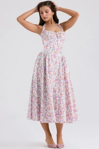 Detailed view of summer slim-fit floral halter dress with blue print and ruffled waist design