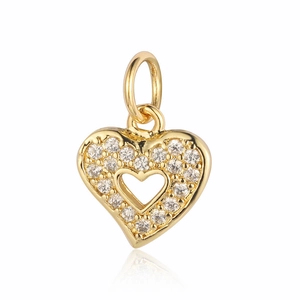 Close-up of golden heart pendant with pavé cubic zirconia and hollow center design