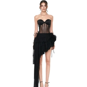 Detailed full view of black strapless boned corset top and irregular ruffled skirt set