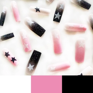 Pink and black gradient press-on nails with glitter star patterns in long square shape
