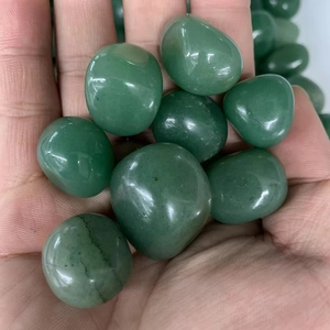 Natural polished green yuhua stones held in hand for aquarium and garden landscape decor