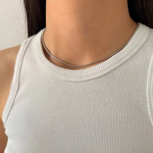 Minimalist silver stainless steel snake chain necklace for women worn on collarbone