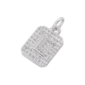 Close-up of square silver pendant with pave-set cubic zirconia and letter L detail