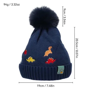 Bonnet en tricot d'hiver avec motifs jacquard de dinosaures et pompon moelleux
