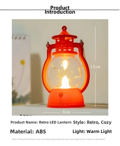 Detail view of a vintage red LED lantern showing 12cm height and warm glowing light