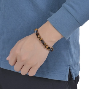 Men's 8mm Tiger Eye stone beaded bracelet with black stainless steel spacers on wrist