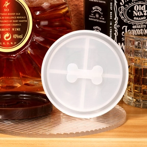 Close-up of silicone coaster mold with bone shape for resin casting and DIY crafts