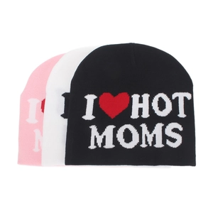 Three-pack knit beanies in black white and pink featuring I Love Hot Moms heart pattern