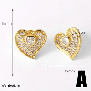 Detailed view of heart-shaped gold-plated earrings with zircon pave and size markings