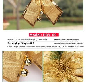 Detail view of golden Christmas bows with bells showing size specs and fabric texture