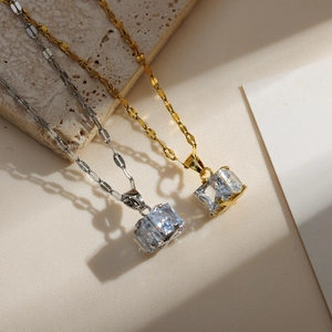 Elegant gold and silver necklaces featuring square cut zircon pendants on stylish flat chains