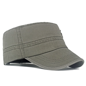 Close-up of reinforced triple stitching on the brim of a washed cotton cadet military cap