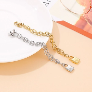 Elegant gold and silver link chain bracelets with star-engraved padlock pendants