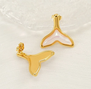 Detailed view of 18K gold plated whale tail earrings with iridescent resin inlay
