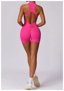 Back view of high-stretch rose red yoga bodysuit with racerback and ruched butt detail