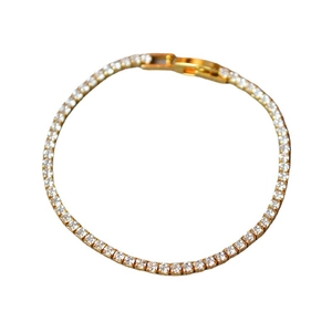Minimalist gold plated brass tennis bracelet with sparkling round cubic zirconia crystals