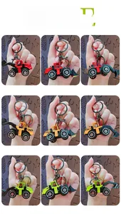 Close-up of colorful mini construction vehicle keychains in various mechanical styles