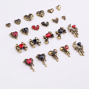 20pcs vintage gold alloy nail art charms with heart shapes and red rhinestones