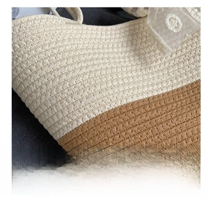Macro shot showing the dual-tone straw weaving texture and fine fabric details