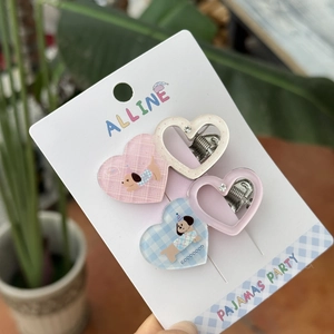 Four-piece set of heart-shaped acrylic hair clips with dog prints and rhinestones