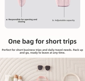 Pink waterproof travel toiletry bag showing zipper closure and adjustable capacity buckles