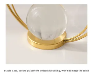 Macro detail of stable gold metal base and crystal ball for elegant home decor
