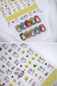 Detail of cheese and hamster embossed nail stickers applied on Morandi nails