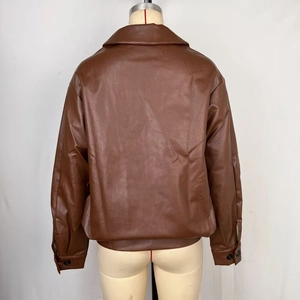 Detailed back view of vintage brown faux leather jacket with casual loose fit tailoring
