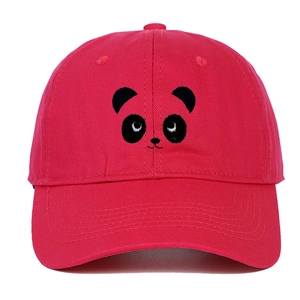Detailed close-up of vivid panda face embroidery on a red cotton baseball cap