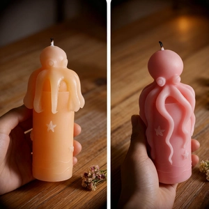 Handcrafted octopus pillar candle in pastel colors with ocean theme starfish relief