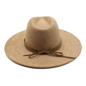 Vintage khaki wide brim fedora hat with brown leather band and suede texture