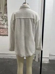 Rear view detail of white faux fur jacket showing high-quality fleece texture and stitching