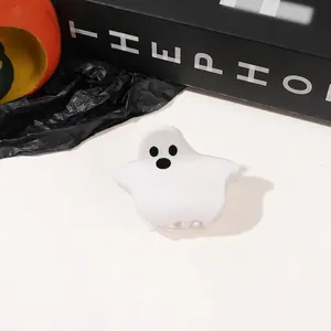 Close-up of white matte ghost hair claw clip for Halloween party hair styling